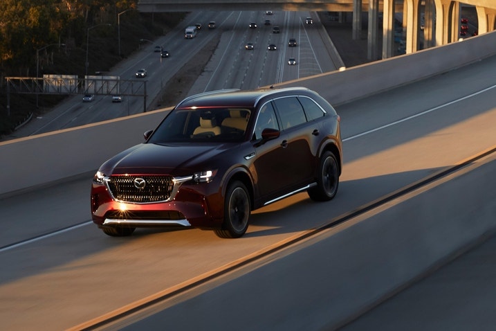 2024 Mazda CX-90 front three-quarters view on the road