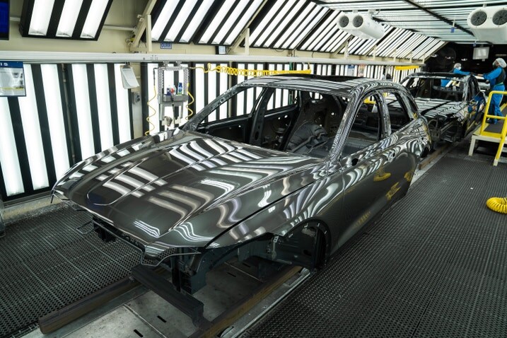 Hyundai and Genesis vehicles on an assembly line