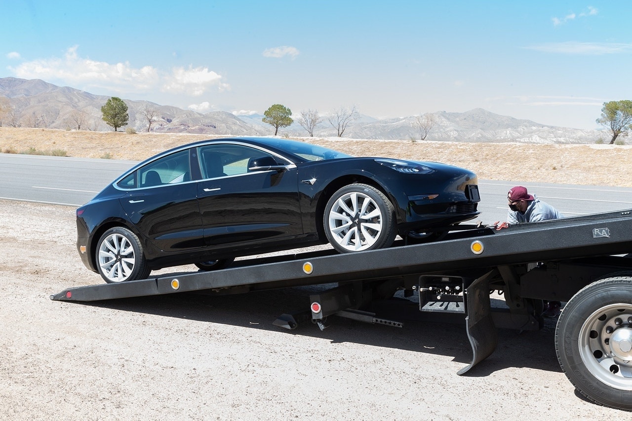 2020 Tesla Model 3 being towed