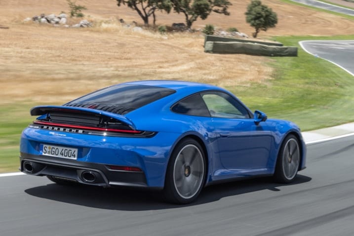 2025 Porsche 911 Carrera action rear 3/4