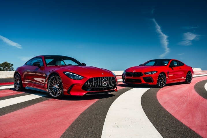 2024 Mercedes-Benz AMG GT 63 and 2024 BMW M8 Competition group shot