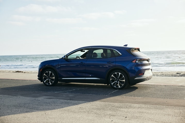 2023 VinFast VF 8 City Edition rear view while parked near the ocean