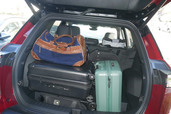 Chevrolet Equinox cargo area with six bags and the floor removed