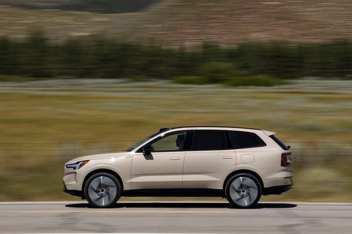 2025 Volvo EX90, shown in profile driving