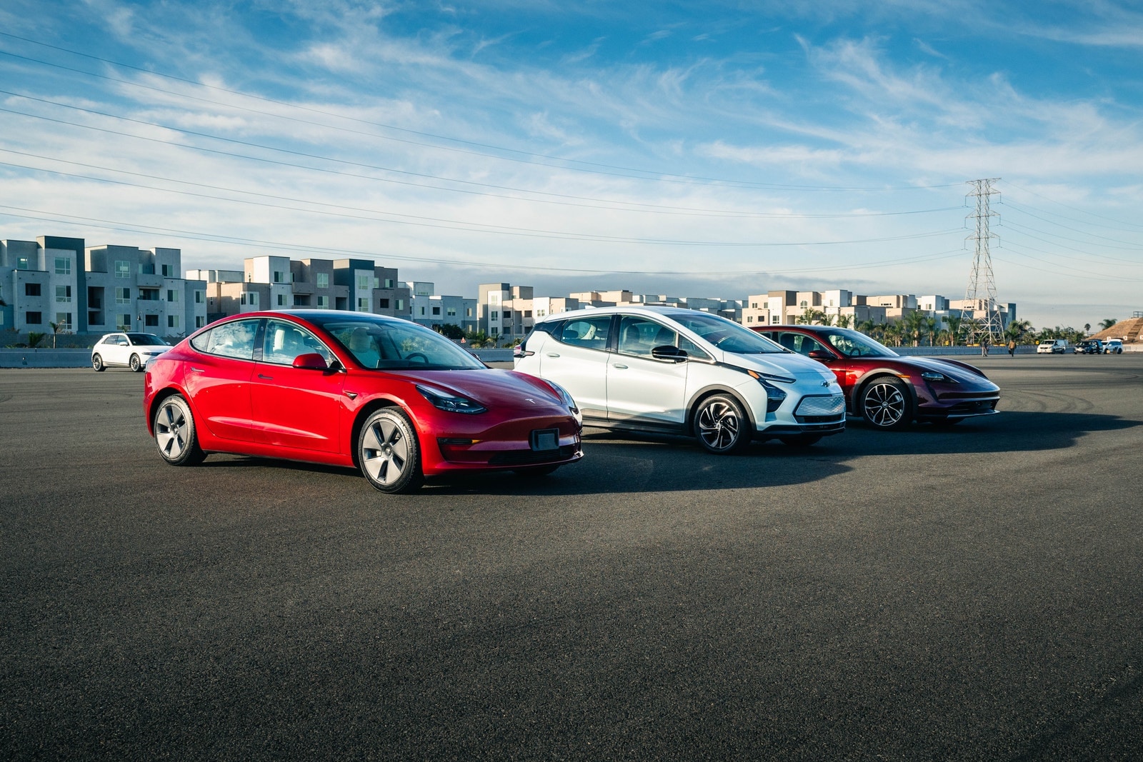 2023 Edmunds Top Rated Electric Car finalists: Tesla Model 3, Chevy Bolt and Porsche Taycan Cross Turismo