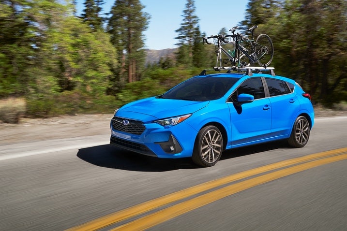 2024 Subaru Impreza front, on the road