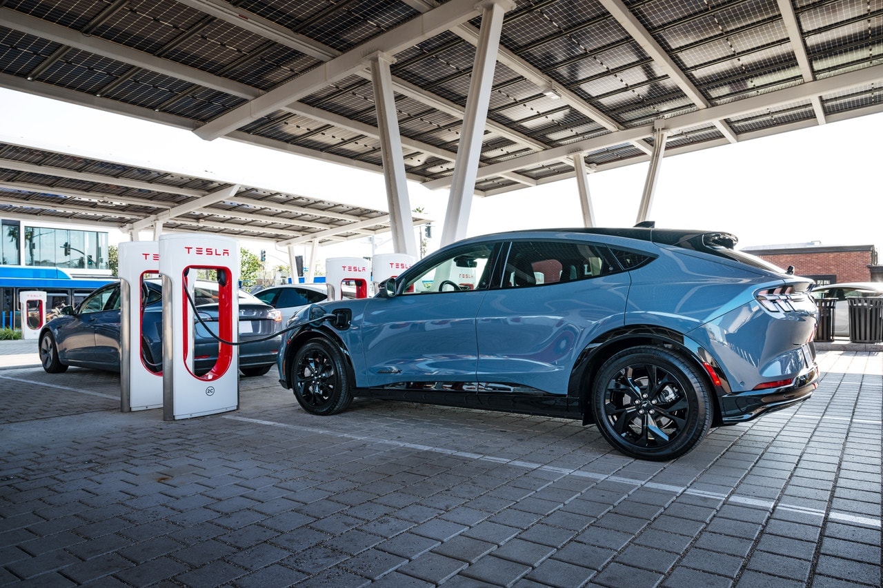 2024 Ford Mustang Mach-E charging at Tesla Supercharger