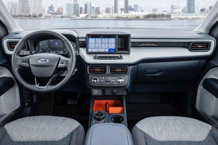 View of the dashboard of the Ford Maverick XLT, taken from the back seat