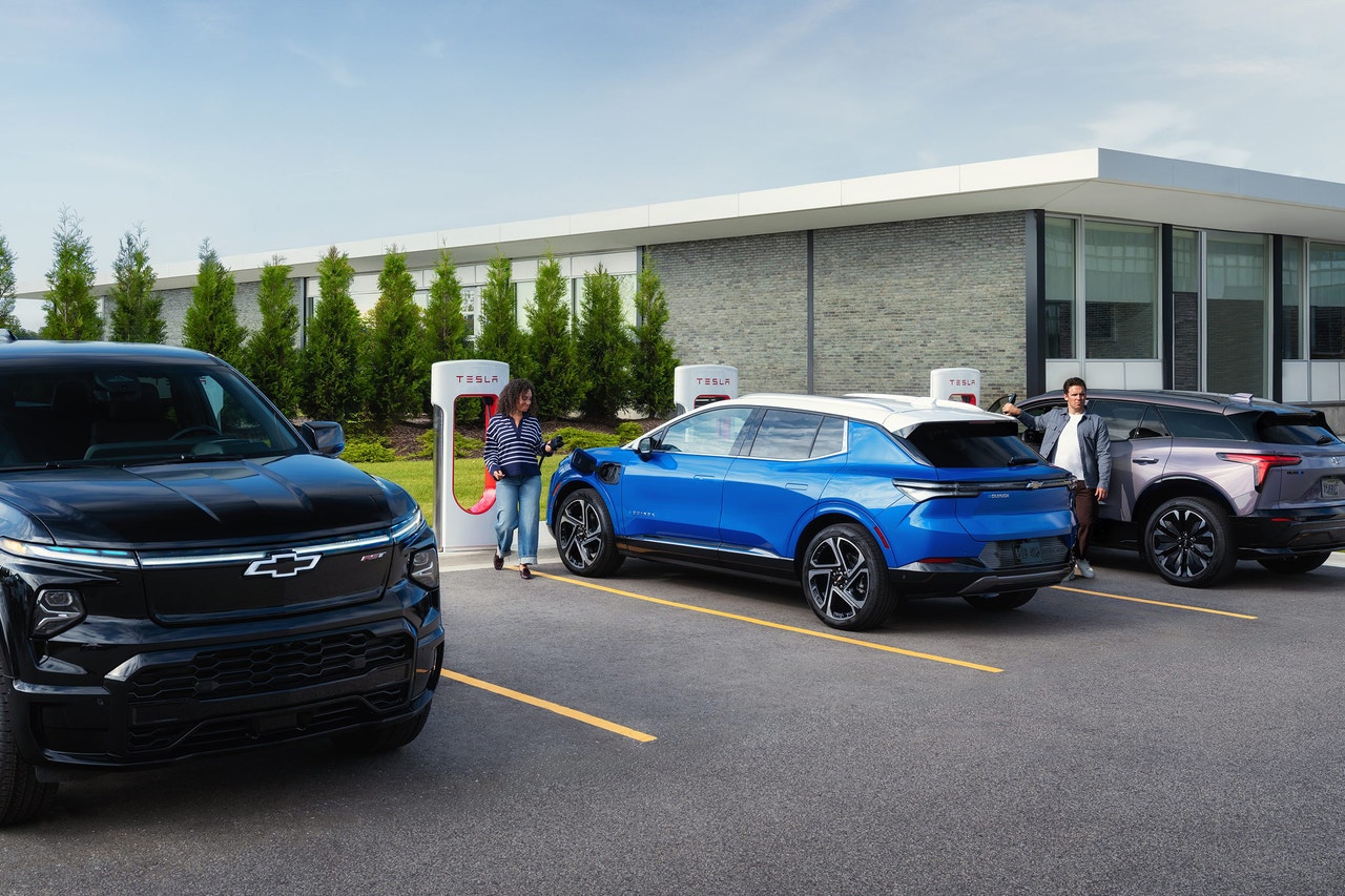 Chevy EVs charging at a Tesla Supercharger