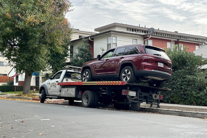 2023 Jeep Grand Cherokee 4xe on a tow truck