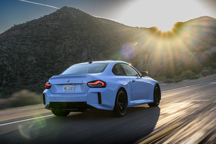 2023 BMW M2 rear three-quarters view, on the road