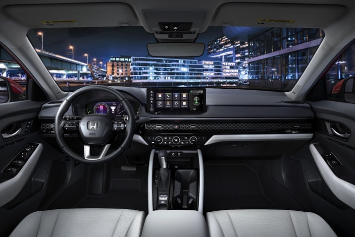 2023 Honda Accord Touring interior showing gray leather seats and the dashboard.