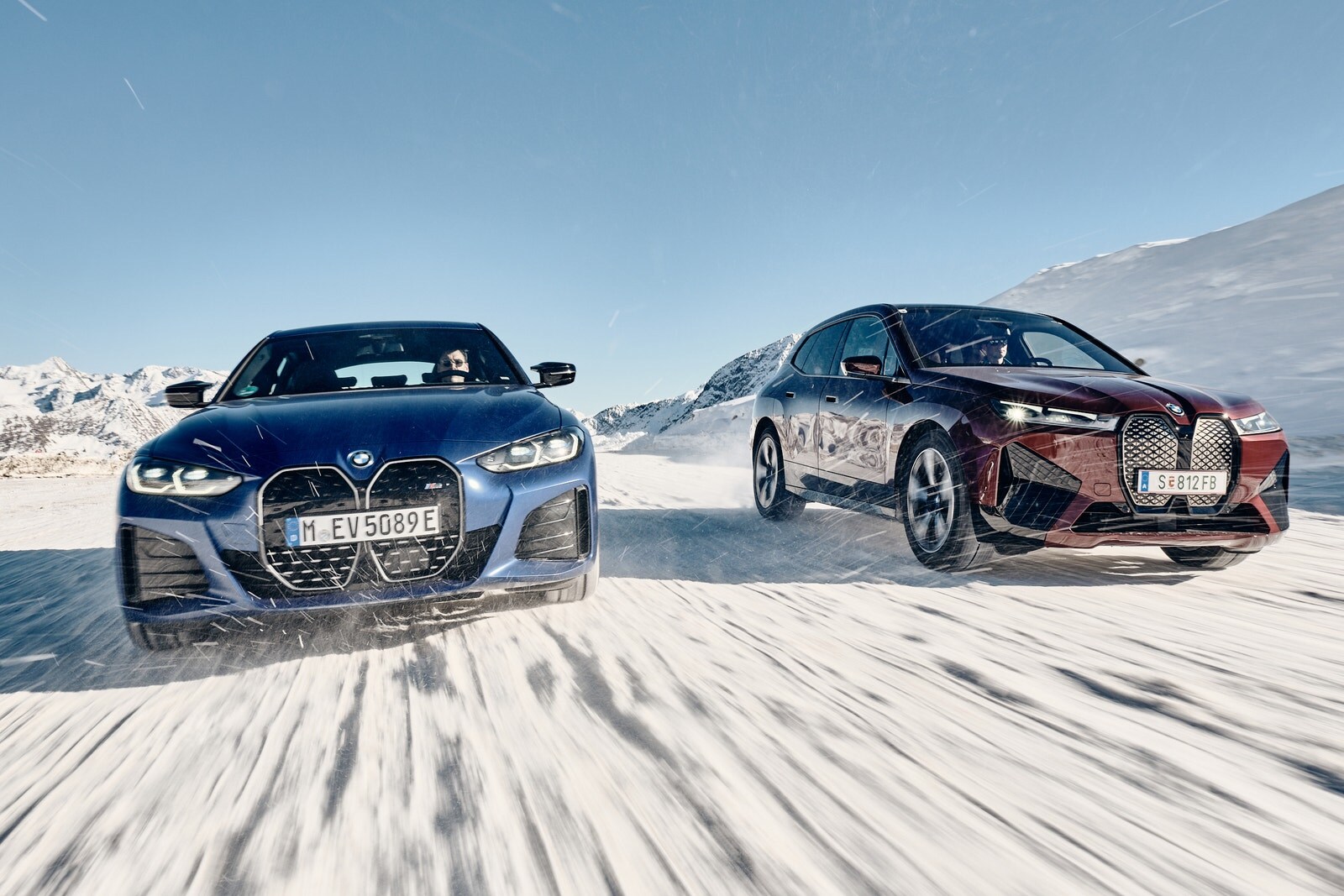 2022 BMW i4 and BMW iX driving on snow