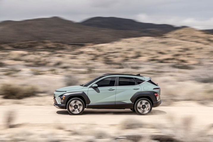 2024 Hyundai Kona in profile, driving