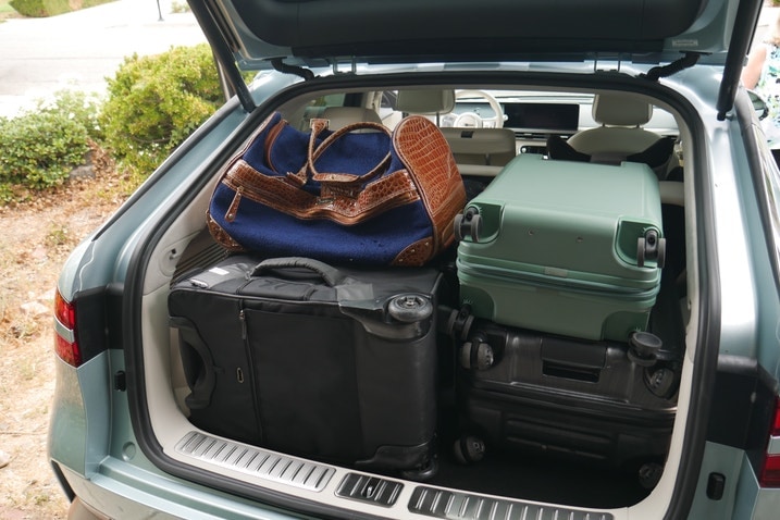 Six suitcases in Genesis GV60 cargo area