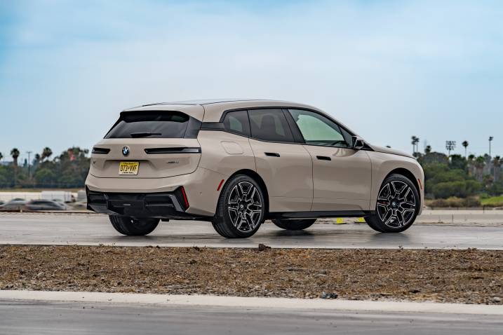 2025 BMW iX xDrive45 rear three-quarters
