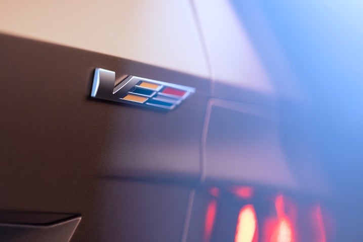 A close up shot of a V badge on a Cadillac Lyriq-V.