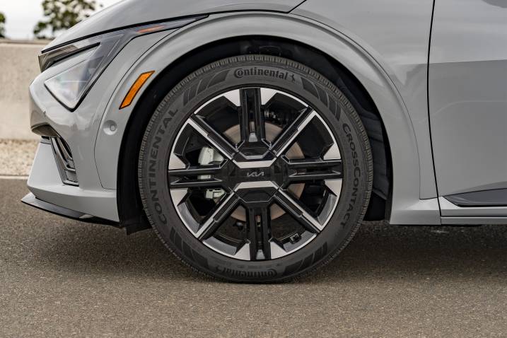 An image of a 2025 Kia EV6 GT-Line wheel while parked on a race track.
