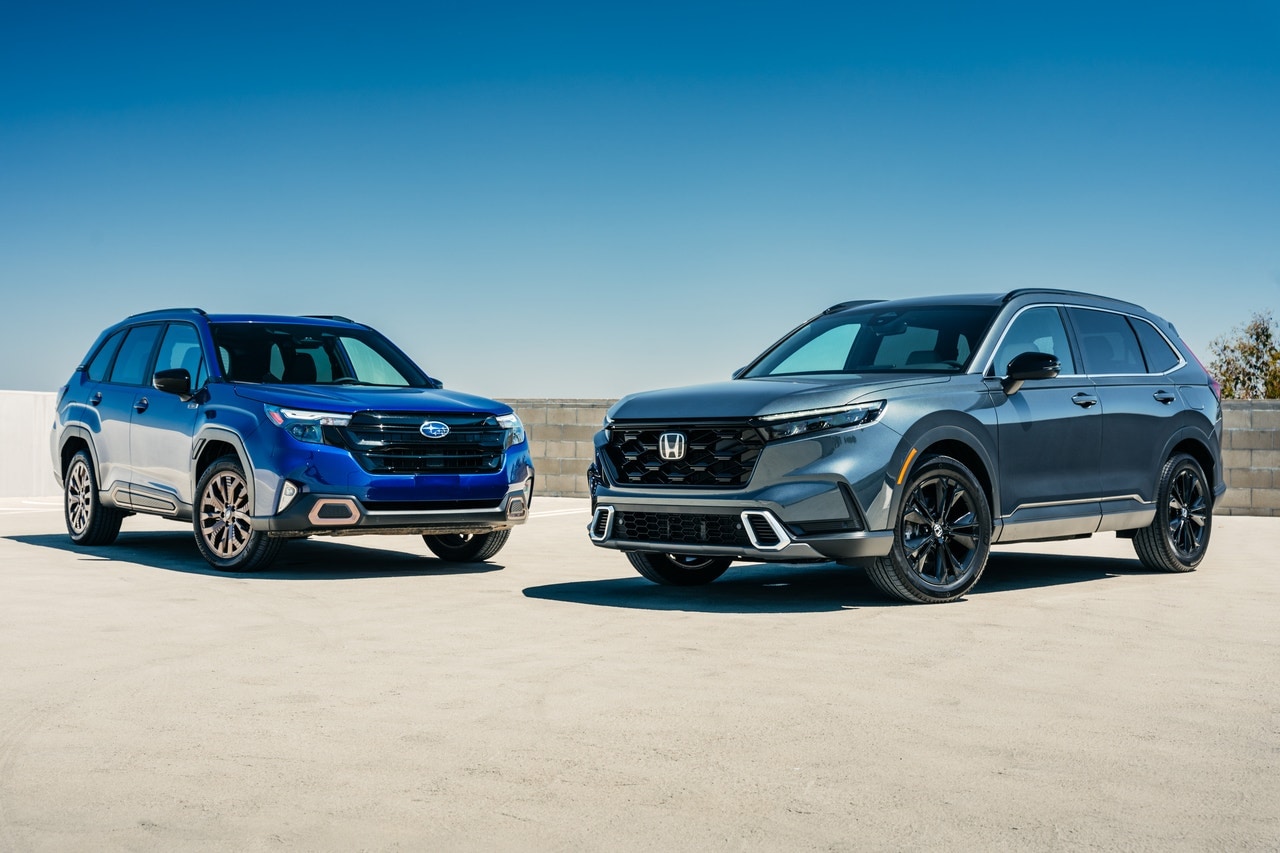 2025 Subaru Forester Hybrid and 2025 Honda CR-V Hybrid group shot
