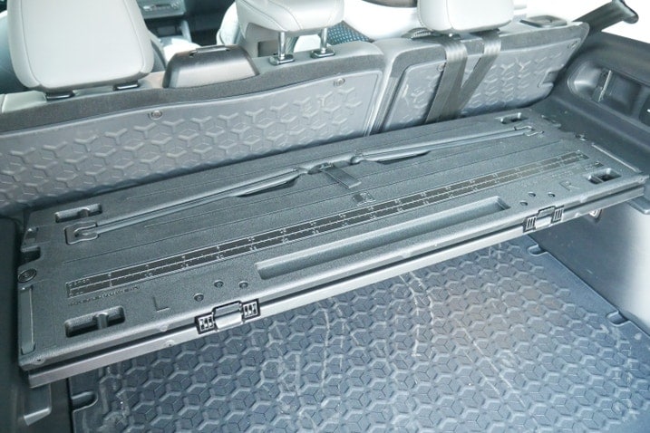 Ford Bronco Sport Cargo Management System folded with measuring tape