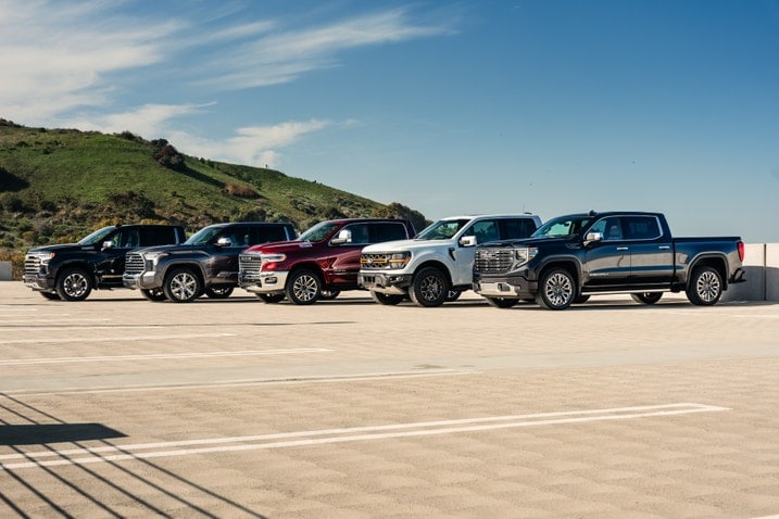 Group photo of full-size trucks that Edmunds is comparing: the Ford F-150, Chevrolet Silverado, Toyota Tundra, Ram 1500 and GMC Sierra
