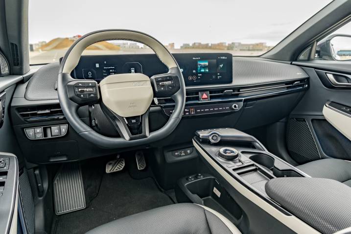 An image of a 2025 Kia EV6 GT-Line interior while parked on a racetrack.