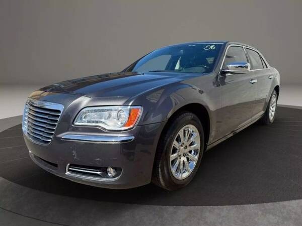 Chrysler 300 with VIN: 2C3CCAEG0EH119156