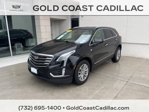 Cadillac XT5 with VIN: 1GYKNCRSXKZ144227