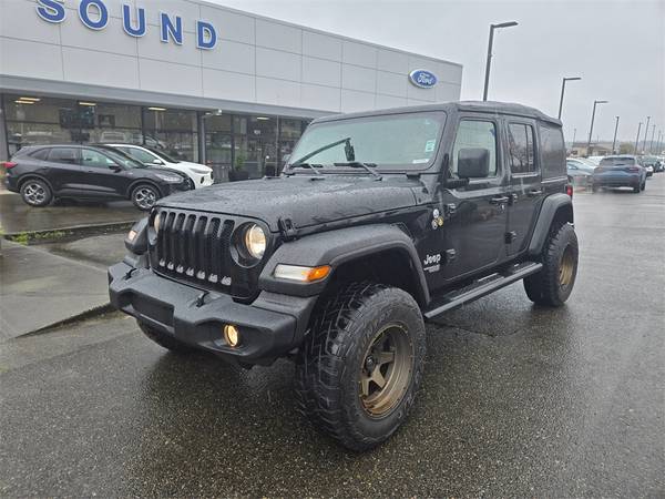 Jeep Wrangler with VIN: 1C4HJXDN7MW517121