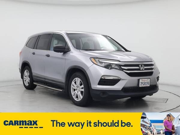 Honda Pilot with VIN: 5FNYF5H11GB004582