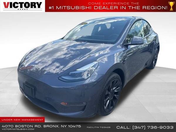 Tesla Model Y with VIN: 7SAYGDEE4PF689694