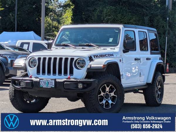 Jeep Wrangler with VIN: 1C4HJXFG2JW128378