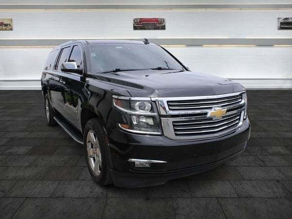 Chevrolet Suburban with VIN: 1GNSCJKC7JR125188