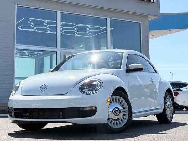 Volkswagen Beetle with VIN: 3VWJ07AT0GM629770