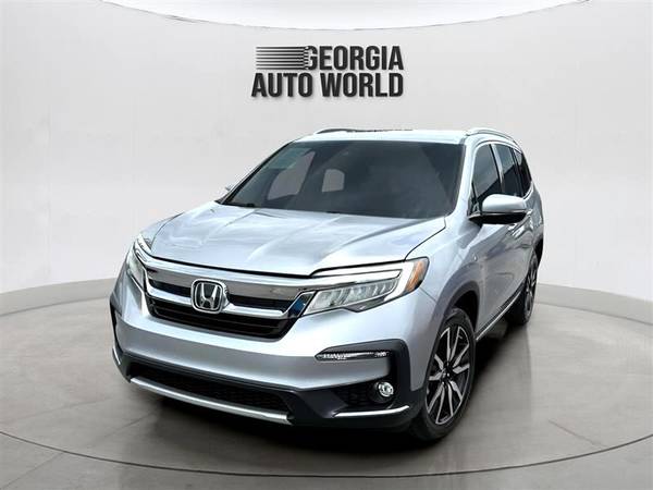 Honda Pilot with VIN: 5FNYF6H02KB070628