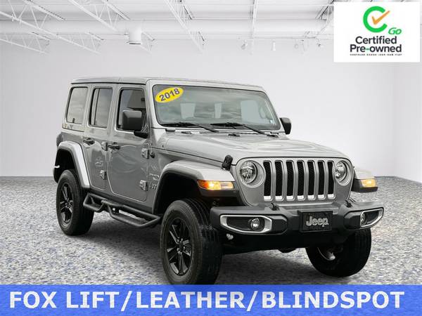 Jeep Wrangler with VIN: 1C4HJXEN6JW202496