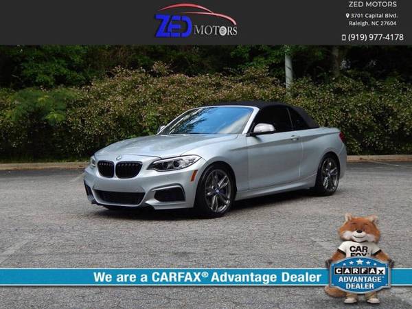 BMW 2 Series with VIN: WBA1M1C54FV393824