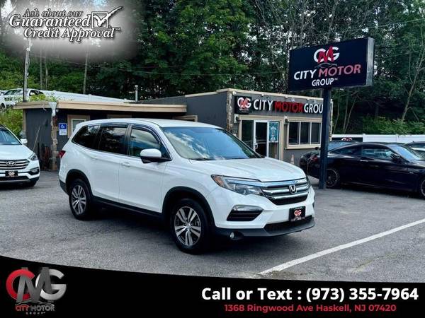 Honda Pilot with VIN: 5FNYF6H37JB073193