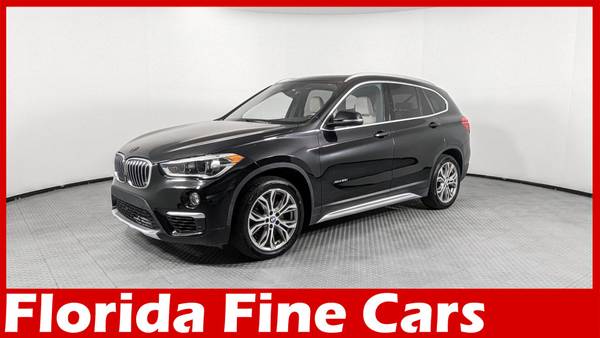 BMW X1 with VIN: WBXHT3Z39H4A57431