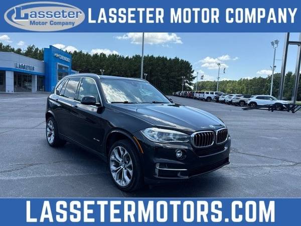 BMW X5 with VIN: 5UXKR2C57J0Z17437