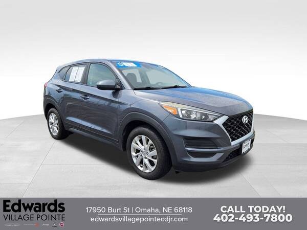 Hyundai Tucson with VIN: KM8J2CA40KU005188