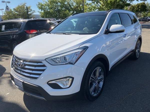 Hyundai Santa Fe with VIN: KM8SR4HFXFU091418
