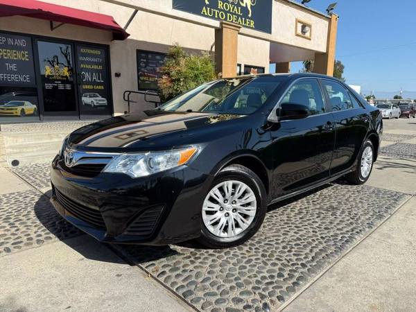 Toyota Camry with VIN: 4T4BF1FK0ER348291