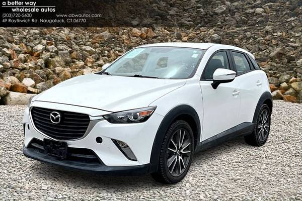 Mazda CX-3 with VIN: JM1DKFC77H0146737