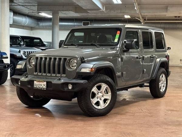 Jeep Wrangler with VIN: 1C4HJXDG4KW568249