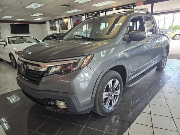 Honda Ridgeline with VIN: 5FPYK3F70HB017081