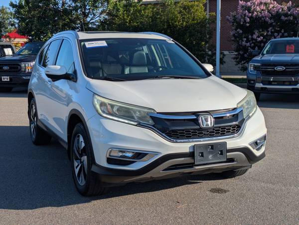Honda CR-V with VIN: 5J6RM3H90GL001233
