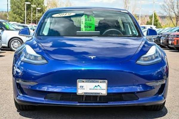 Tesla Model Y with VIN: 7SAYGDEE6NF386848