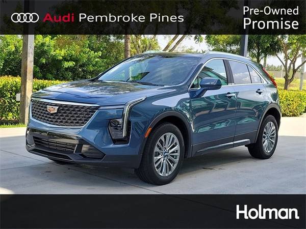 Cadillac XT4 with VIN: 1GYFZCR43RF138787
