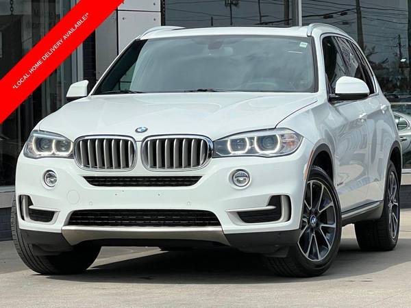 BMW X5 with VIN: 5UXKR0C35H0X79247